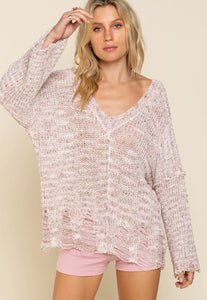 Loose knit distressed v neck sweater